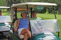 Two-Golfers-in-Cart